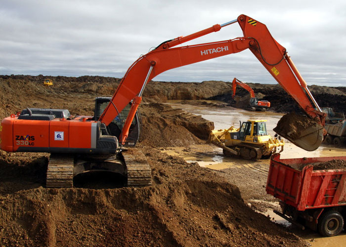 Работа экскаватора на фото Работа экскаватора на фото